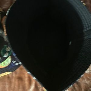 Black emoji pattern bucket hat